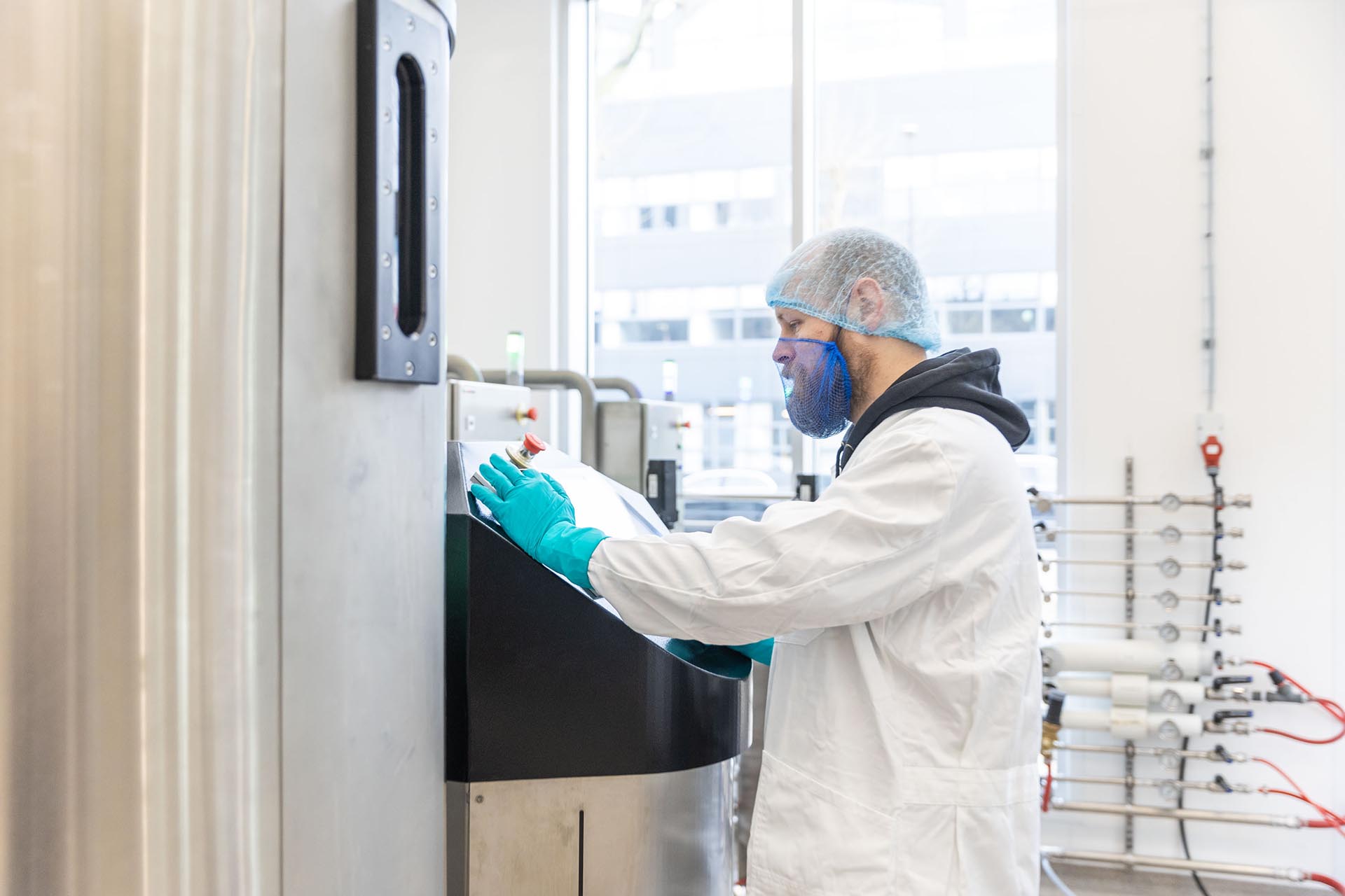 Man working in lab Winclove Probiotics in Amsterdam. Want to join him?