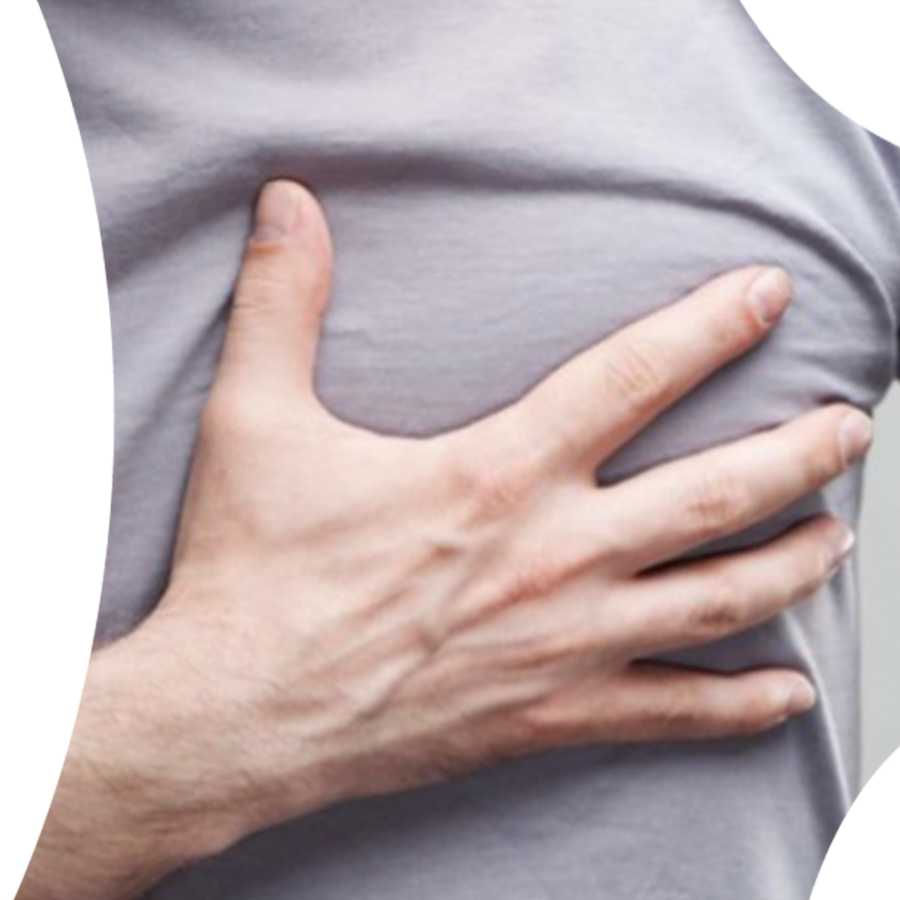 Image of man touching his chest, on the left side where his heart is.