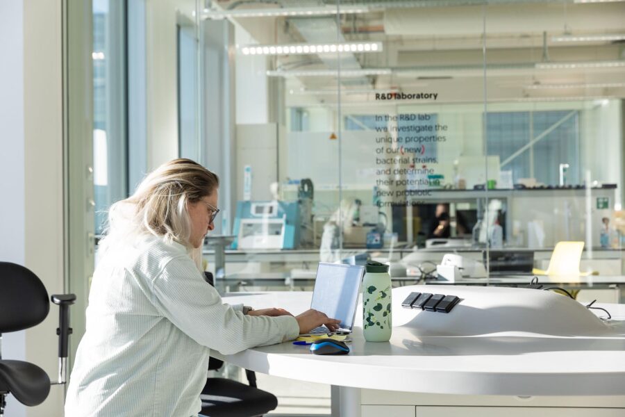 Winclove Probiotics lab technician working on her laptop